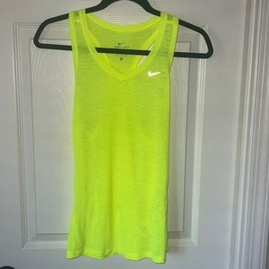Neon yellow Nike tank top. Great for nighttime runs